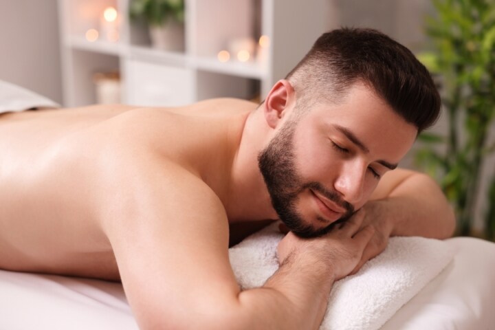 Skin peel treatment on man's back